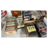 Lot of VCR tapes, some not opened and cassette