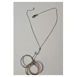 14kt gold & pave set diamond circular pendant