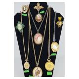 Collection of Lockets Cameos and Watches