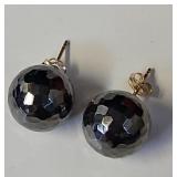 14kt gold earrings with black faceted balls