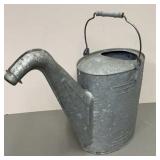 Galvanized water can