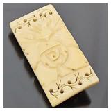 Carved ivory brooch