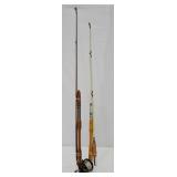 2 deep sea fishing rods with unmarked reel