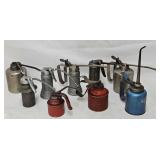 (9) Antique Oil Cans