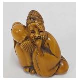 2"H Netsuke ivory figure with water jug signed