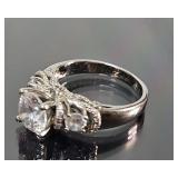 Sterling silver engagement-style ring featuring a