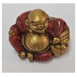 Netsuke, polychrome decorated Buddha, porcelain