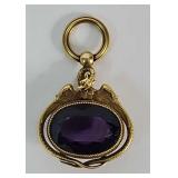 Gold watch fob with snake and amethyst