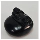 Netsuke, reclining figure on pillow, carved box wo