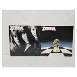 (2) High Grade Zebra Hard Rock LP Records