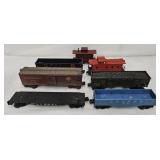 (7)  Asst O-Gauge Train Cars