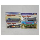(4) ERTL 1:64 Die Cast Tractor Trailers (MIP)