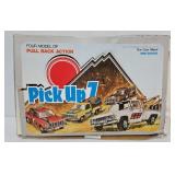 Store Box Of (12) Pull-Back Action Toy Trucks