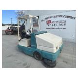 1999 Tennant 6500 60" Ride On Sweeper