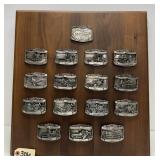 (16) Pewter Massey Harris Belt Buckles on Display
