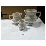 (2) Blue Longaberger Pitchers & (1) Creamer