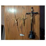 (3) Crucifixes