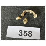 Gold Capped Teeth / Some teeth still attached.