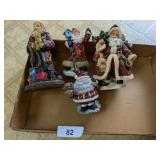 (4) Santa Figurines (4) Santa Figurines