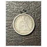 1877 Sitting Liberty Quarter (in a pendant)