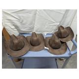 (4) Decorative Metal Cowboy Hats
