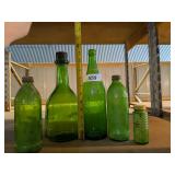 Assorted Green Glass Bottles