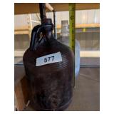 (2) Glass Gallon Jugs: (1) Brown, (1) Clear
