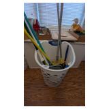 Mops, Brooms, Duster in Laundry Basket