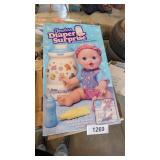 Kenner 1997 Newborn Diaper Surprise Doll