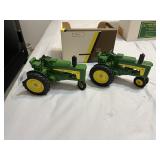 (2) John Deere 630 Diecast Tractors