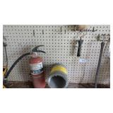 Contents on Wall: Gutter Guard, Fire Extinguisher,