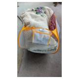 Afghan, Throw Pillows In A Portable Laundry