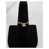 Ladies Ring marked 10k w/ a small stone
