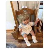 Porcelain Doll on Child