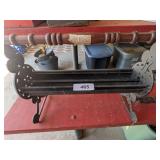 Vintage Cast Iron Newspaper Log Roller