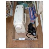 New Home Portable Sewing Machine + A Handy Stitch