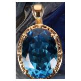 14K YELLOW GOLD LADIES PENDANT W/ BLUE STONE