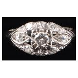 14K WHITE GOLD LADIES RING W/ SEVEN DIAMONDS