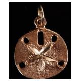 14K YELLOW GOLD LADIES SAND DOLLAR PENDANT