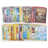 NM POKEMON ASSORTED CARDS LOT OF 57