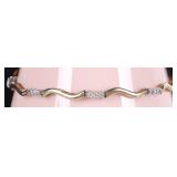 10K YELLOW/WHITE GOLD LADIES BRACELET W/ 24 DIAS
