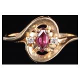 10K YELLOW GOLD LADIES RING W/ MARQUISE RUBY & DIA