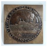 Warszawie Plaque