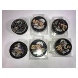 Sabres hockey pucks (6) Mid-2000's
