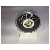 Autographed Sabers Puck Appears to be Martin Biron