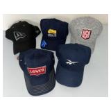 An Assortment of Brand Name Baseball Caps Includin