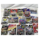 40+ toy race cars & figures all sealed in packages