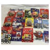 Die-cast race car collection in sealed packages