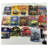 15 toy race cars on sealed packages