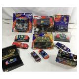 12 toy race cars including truck ,some large and